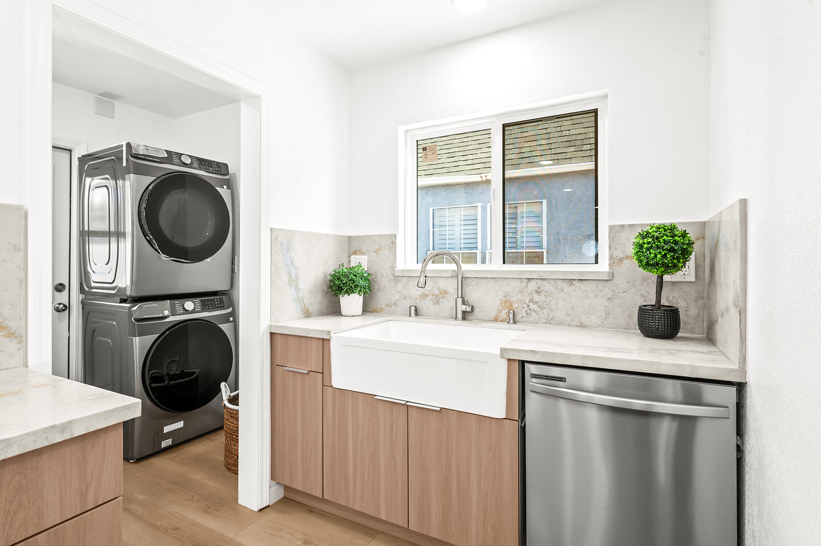 Adjacent laundry with stacked washer dryer