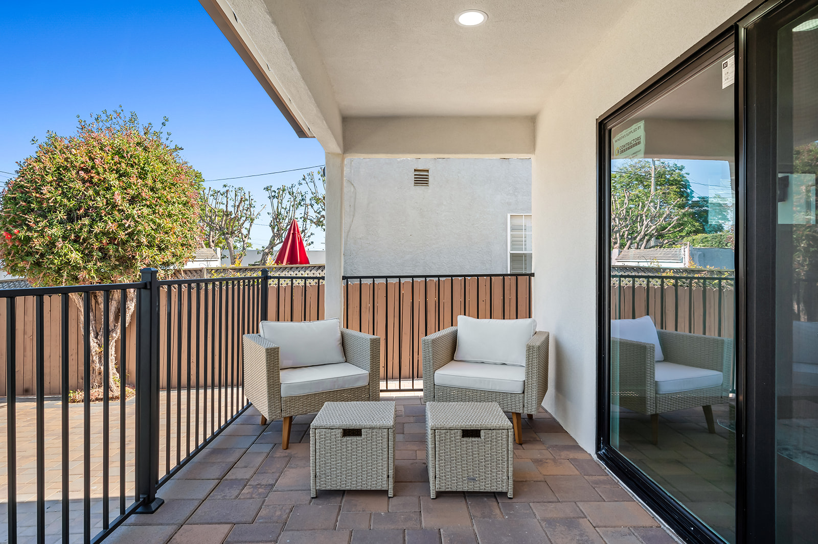 Covered back porch with paver patio